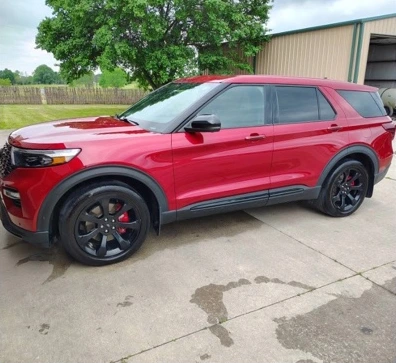 Red Ford SUV after detailing.